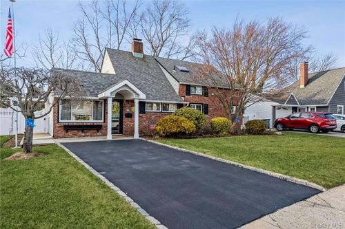 57 Swing Ln, Levittown, NY, 11756-4428 | Card Image