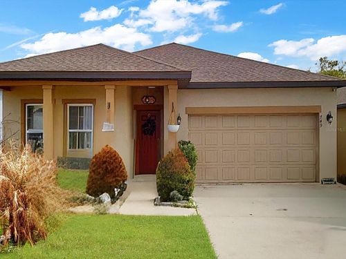 749 Orchid Grove Blvd, DAVENPORT, FL, 33837-9046 | Card Image