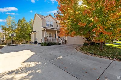 FRONT YARD WITH LARGE 2 CAR GARAGE AND RV PARKING | Image 1