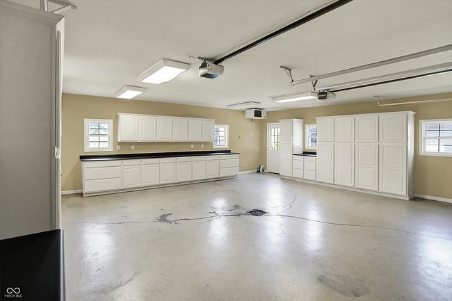 2 CAR ATTACHED GARAGE WITH EPOXY FLOORING AND STORAGE | Image 41