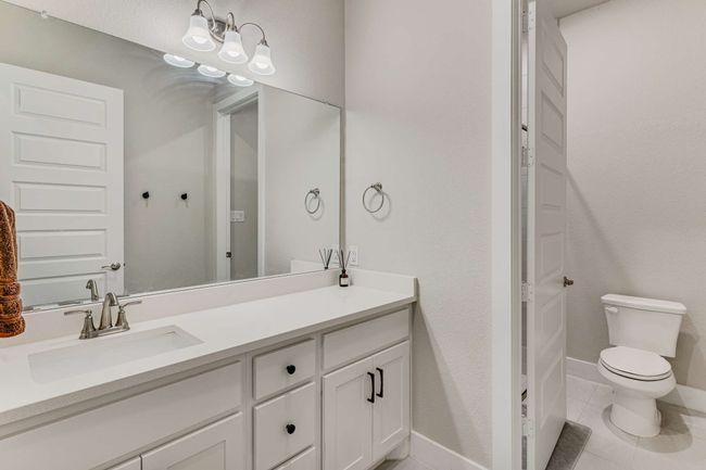 Full bathroom downstairs that serves Guest Bedrooms 2 and 3 | Image 27