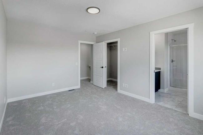 82 Edith Green Nw, Home with 4 bedrooms, 3 bathrooms and 2 parking in Calgary AB | Image 15