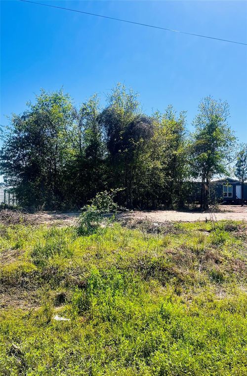 1942 County Road 3542, Cleveland, TX, 77327-3386 | Card Image