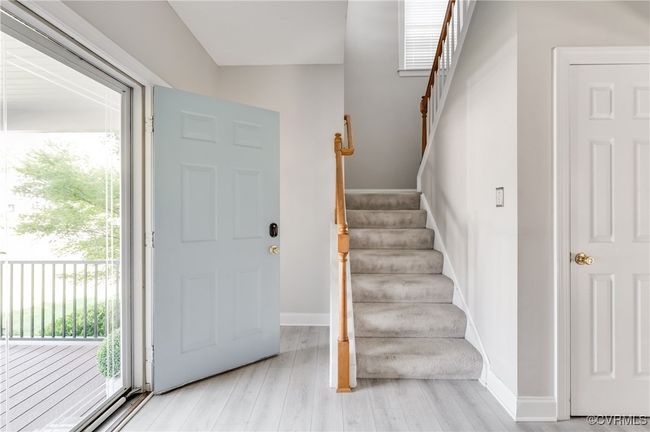 Foyer entrance with plenty of natural light, stairway, and light wood-style flooring | Image 5