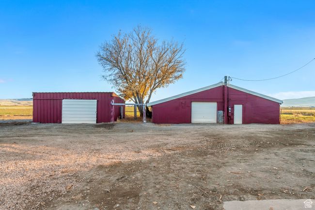 Shop building on the right, one-car garage on the left | Image 10
