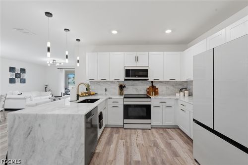 20652 Plumwood Loop, North Fort Myers, FL, 33917-8140 | Card Image