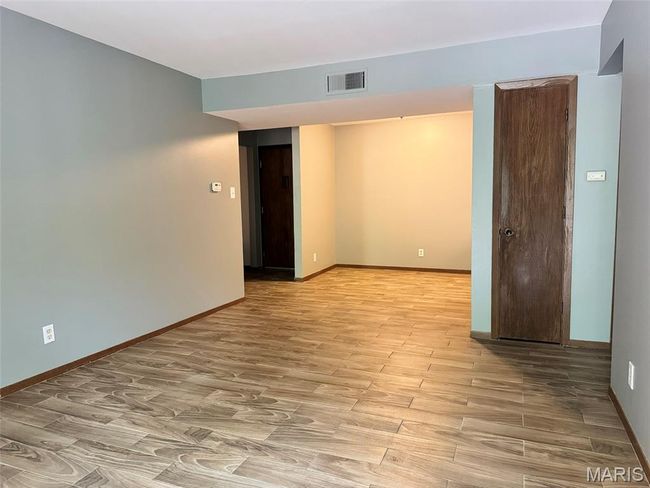 Unfurnished room featuring light wood finished floors and baseboards | Image 10