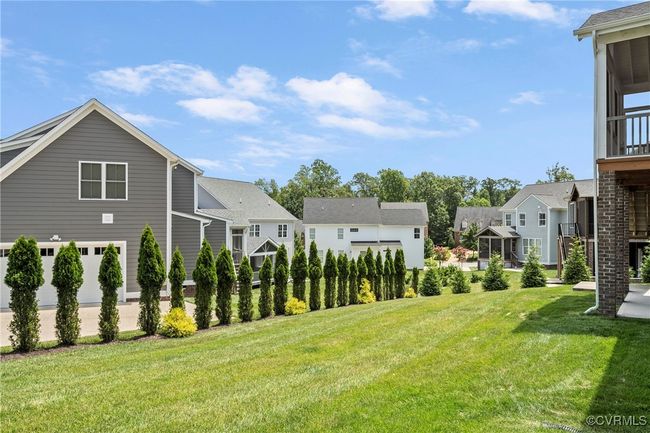 View of grassy yard featuring a residential view | Image 47