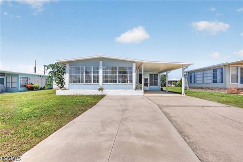 557 Peace Lake Ct, NORTH FORT MYERS, FL, 33917-7411 | Card Image