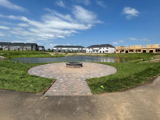 Neighborhood firepit overlooks pond | Image 33