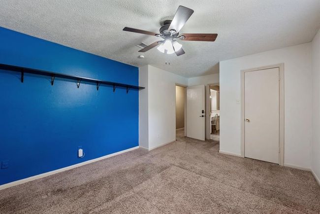 Head upstairs to find 4 spacious bedrooms. This one is at the top of the stairs. | Image 22