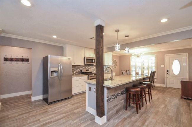 Open and spacious kitchen with rustic/modern touches | Image 8
