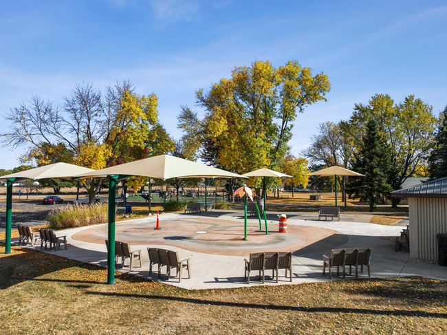 Lions Park is a 50-acre park with splash pad, basketball court, playground, tennis and pickleball courts, hockey rink and skating area..jpg | Image 35