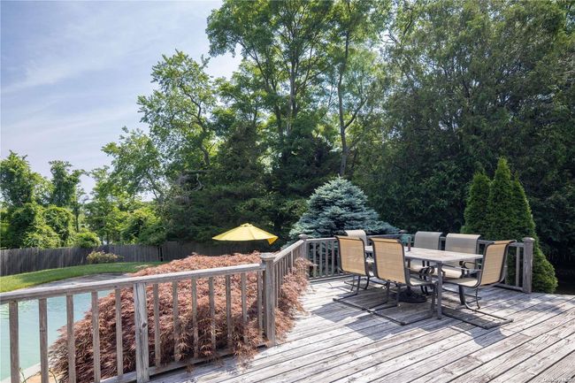 Spacious deck overlooking pool | Image 4