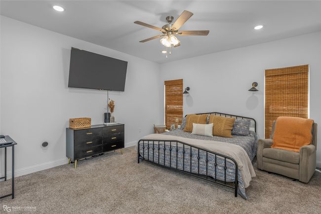 Bedroom with recessed lighting, carpet, baseboards, and ceiling fan | Image 13