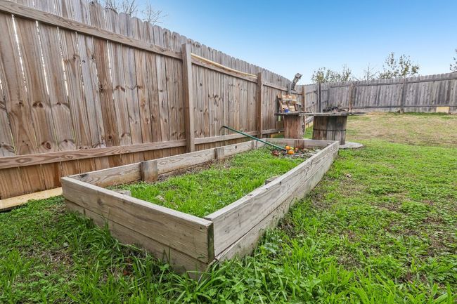 View of yard featuring a garden and fence private yard | Image 25