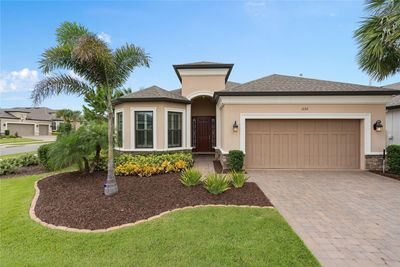 This Lazio offers a Bay Window accented by Stone and beautiful curb appeal | Image 1