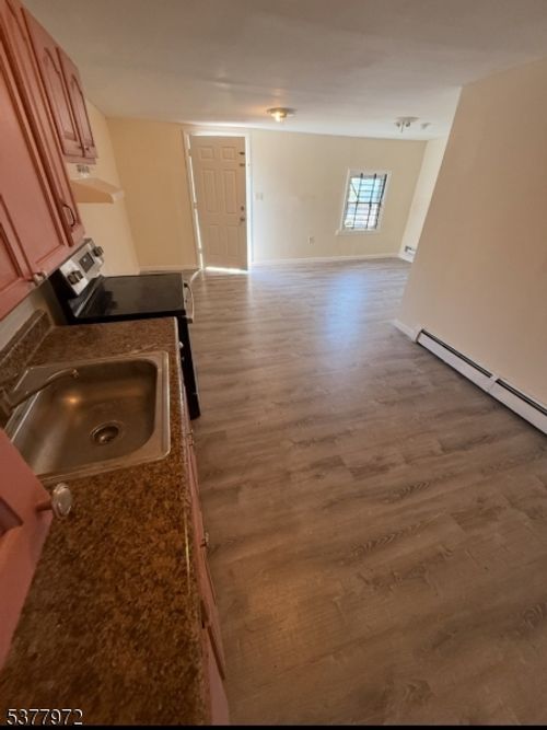 112 Warren St, Paterson, NJ, 07524-2415 | Card Image