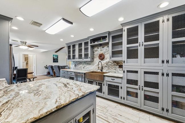 This kitchen is perfect blend of style, functionality, and convenience—a true chef's delight! | Image 6