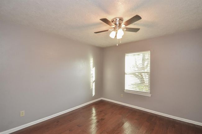 Bedroom #3- spacious with walk in closet and ceiling fan | Image 18
