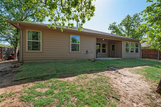 Back of house with a patio, fence, and a lawn | Image 29