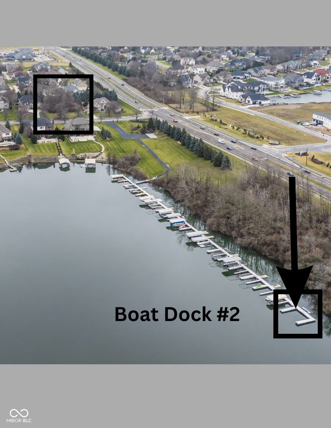 Birds eye view of property with a deeded boat dock. | Image 17