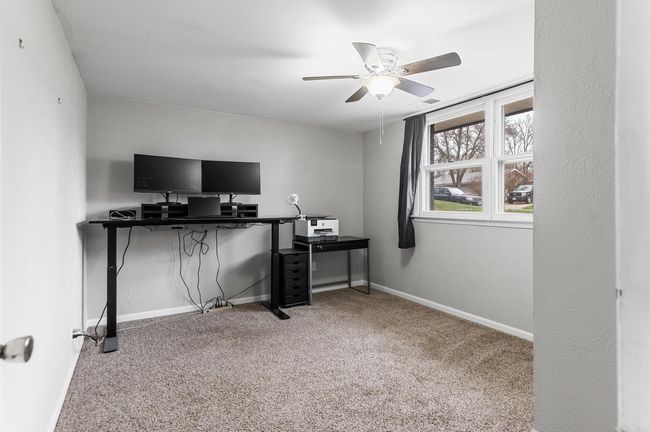 Lower level bedroom currently being used as an office | Image 20