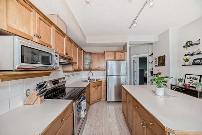 306 - 4 14 Street Nw, Home with 2 bedrooms, 1 bathrooms and 1 parking in Calgary AB | Image 5