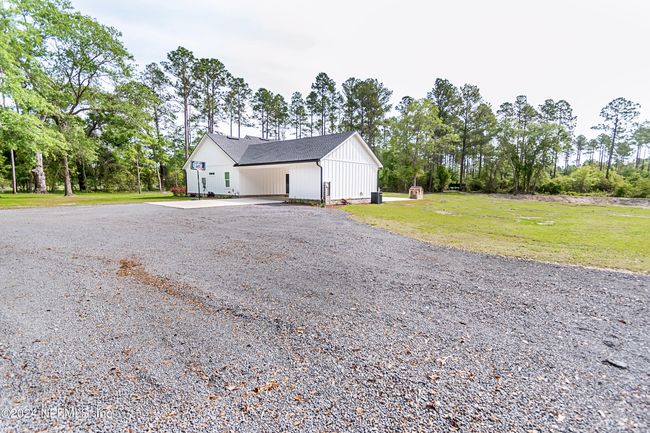 7052 Cottontail Ln, House other with 4 bedrooms, 3 bathrooms and null parking in GLEN ST. MARY FL | Image 64