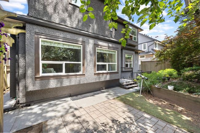 View of side of home with a patio | Image 32