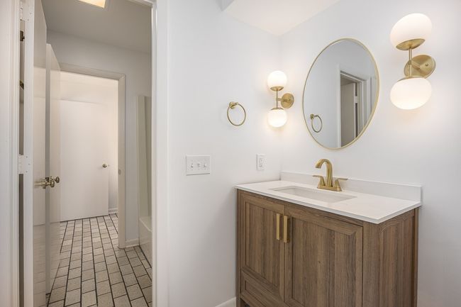 Third level -Beautifully renovated Jack-and-Jill bathroom with 2 toilets. | Image 45