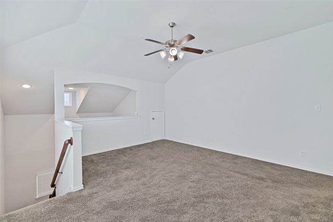 Bonus room featuring lofted ceiling, a ceiling fan, carpet flooring, and recessed lighting | Image 20
