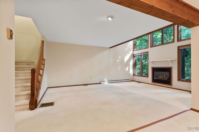 Stairs leading to second floor are just off the family room! | Image 20