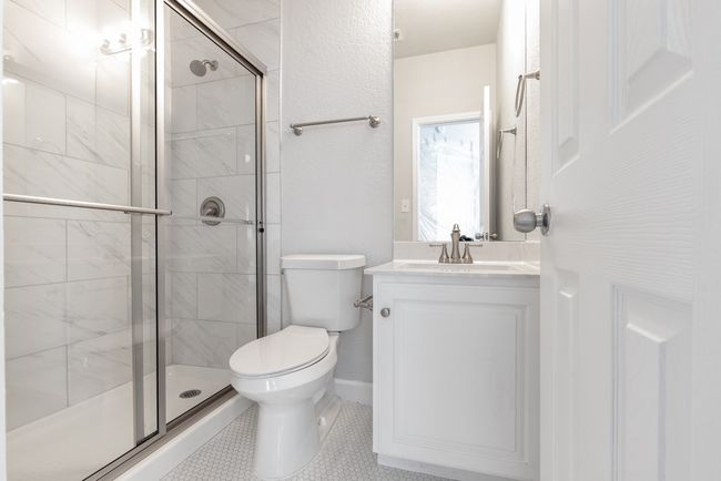 Full bathroom with a stall shower and vanity | Image 12