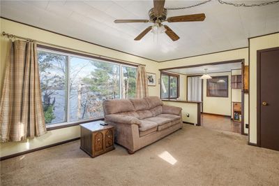 Living area w/large windows, w/waterviews - cable/internet ready, plus antenna for local channels & ceiling fan | Image 3