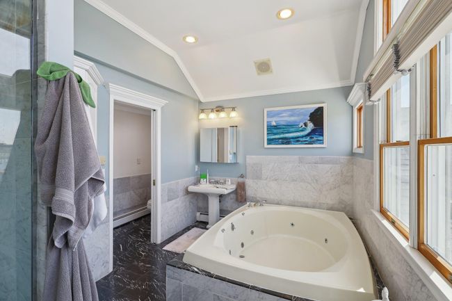 Bedroom featuring access to outside, ensuite bathroom, crown molding, and recessed lighting | Image 28