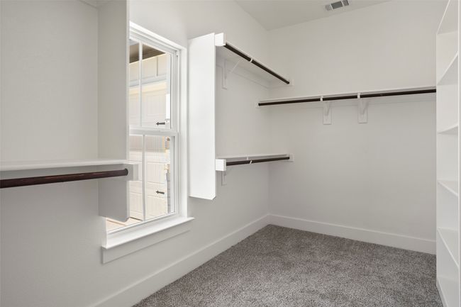 Spacious closet featuring carpet floors | Image 14