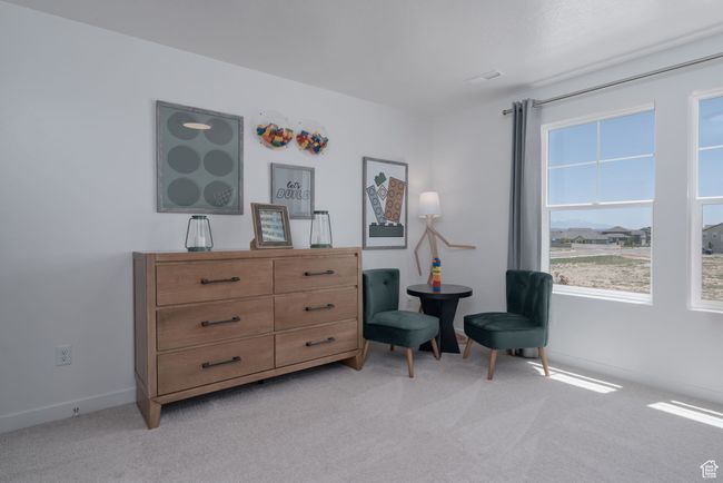 Sitting room with light colored carpet and baseboards | Image 11
