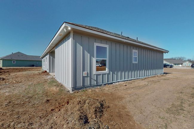 View of home's exterior featuring board and batten siding | Image 39