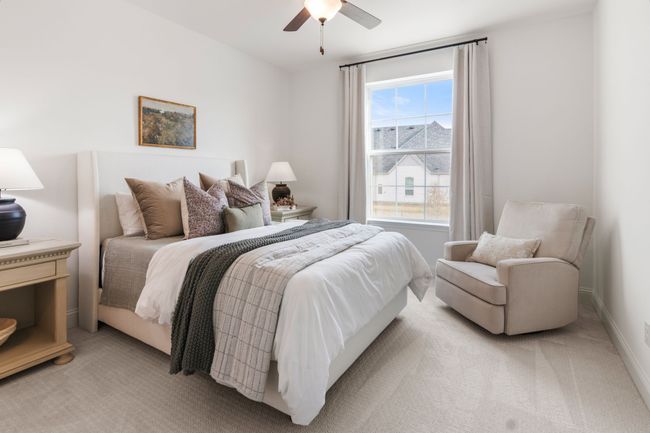 Bedroom with light carpet and ceiling fan | Image 32