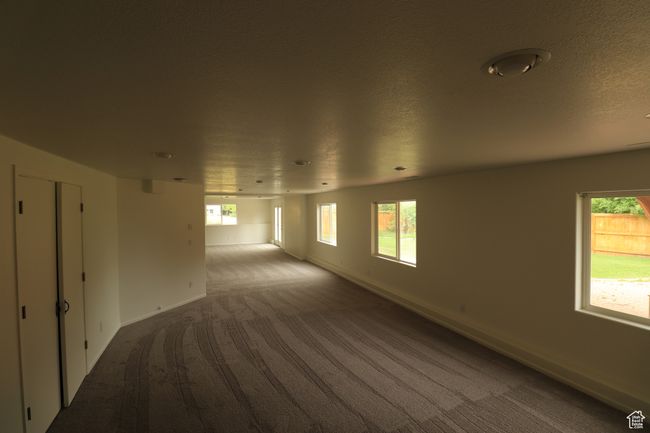 Spare room with carpet flooring and baseboards | Image 15