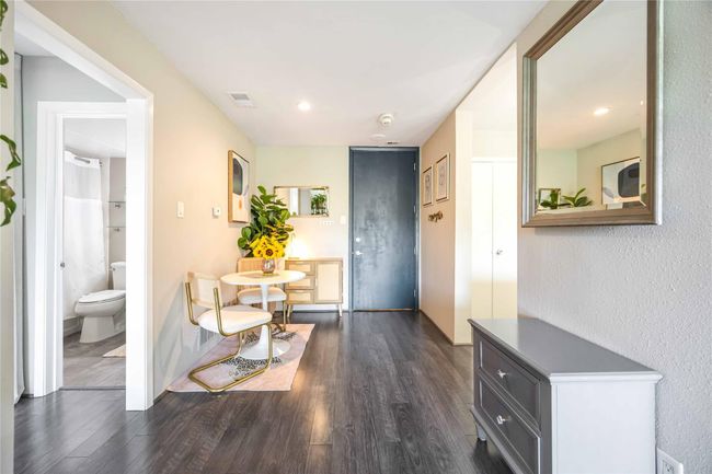 The inviting entryway warmly welcomes you home, setting the tone for the rest of the space. | Image 11