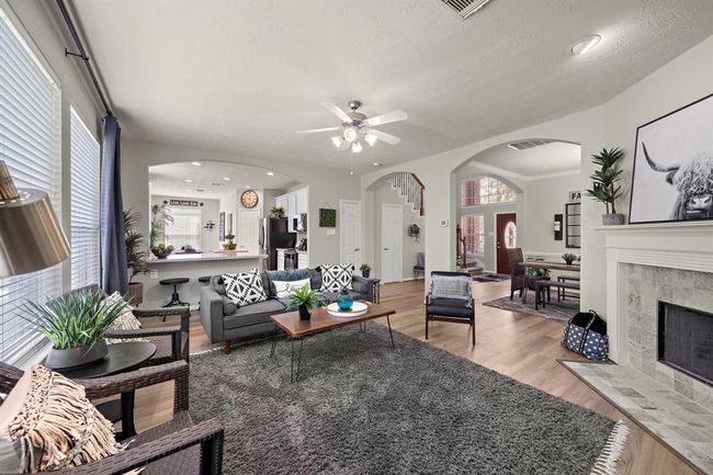 Another view of family room leading to kitchen and dining room. | Image 9