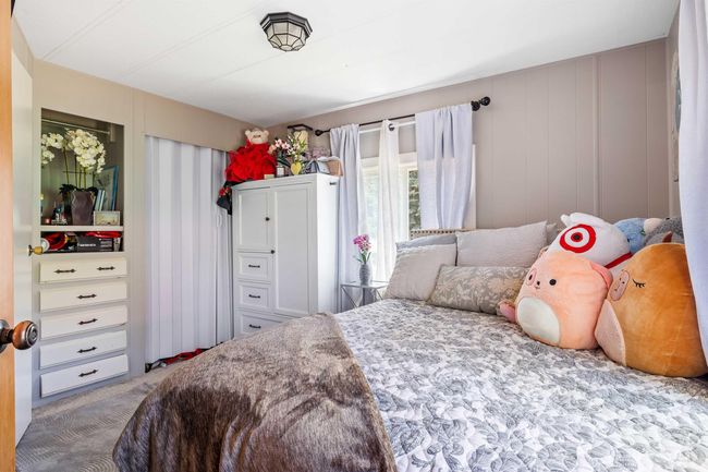Bedroom featuring carpet floors | Image 16