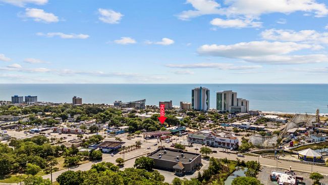 View of urban area featuring a nearby body of water | Image 38