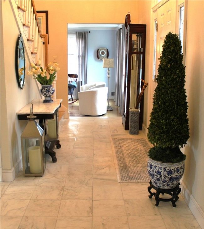 Side view of Marbled floor- entry to Sunken Living Room | Image 7