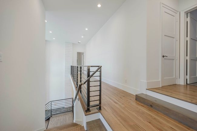 Stairway featuring recessed lighting and wood finished floors | Image 27