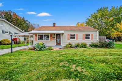 View of front of home with a front lawn | Image 1