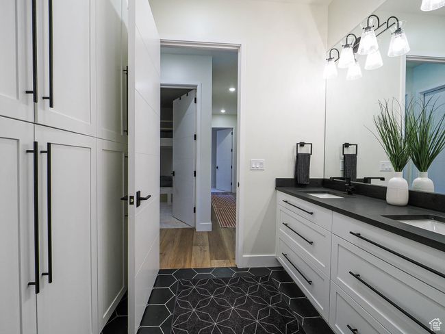 Full bath with tile patterned flooring and double vanity | Image 90
