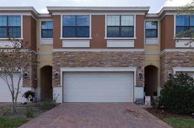 1748 Portofino Meadows Boulevard, Townhouse with 4 bedrooms, 2 bathrooms and null parking in ORLANDO FL | Image 1